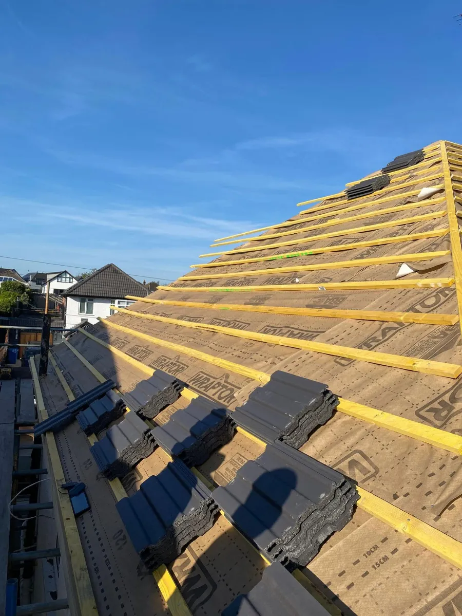 New roof going on: breathable membrane, battens and tiles loaded out