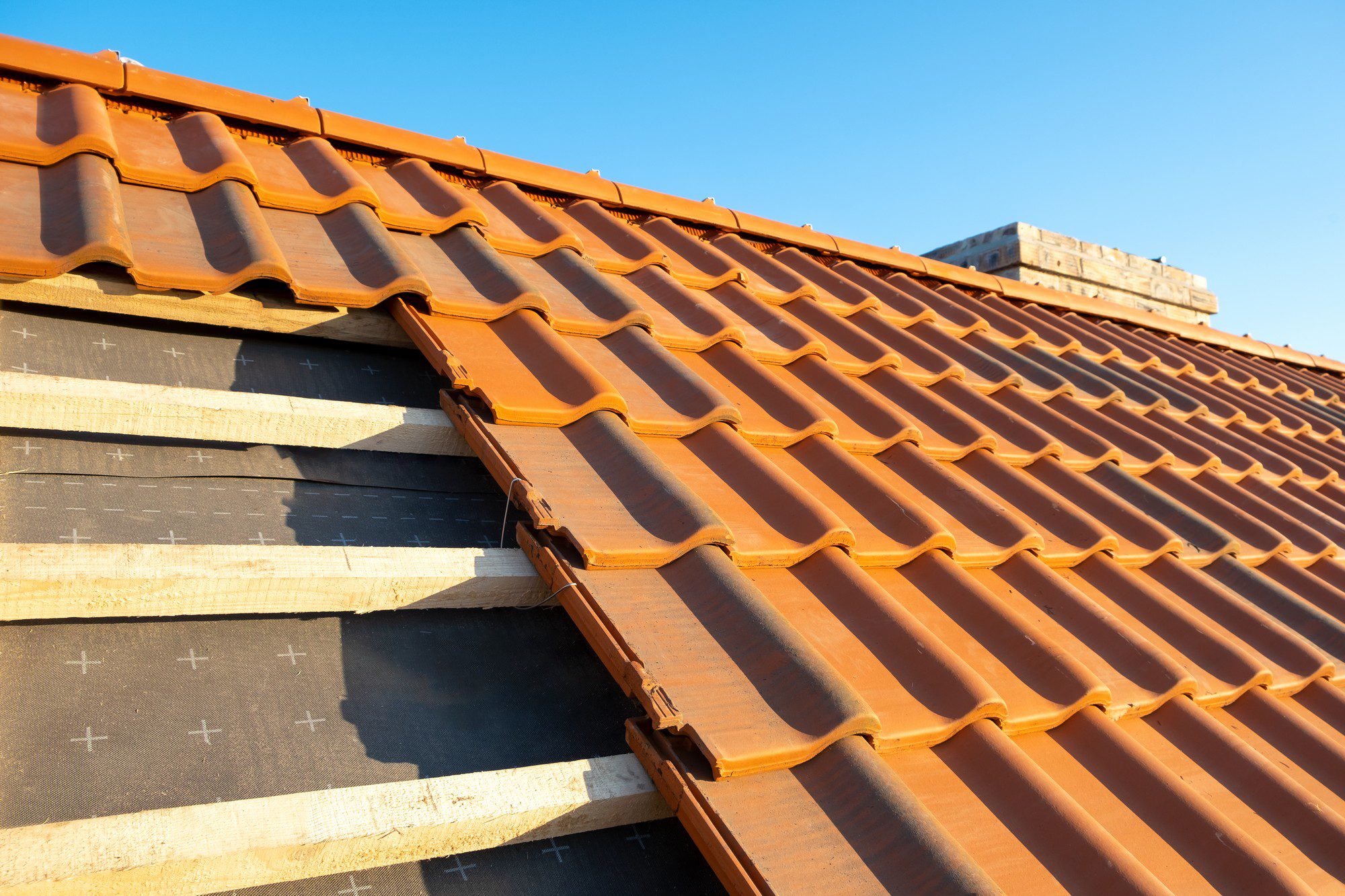 Overlapping Rows Of Yellow Ceramic Roofing Tiles M 2021 12 27 17 42 01 Utc